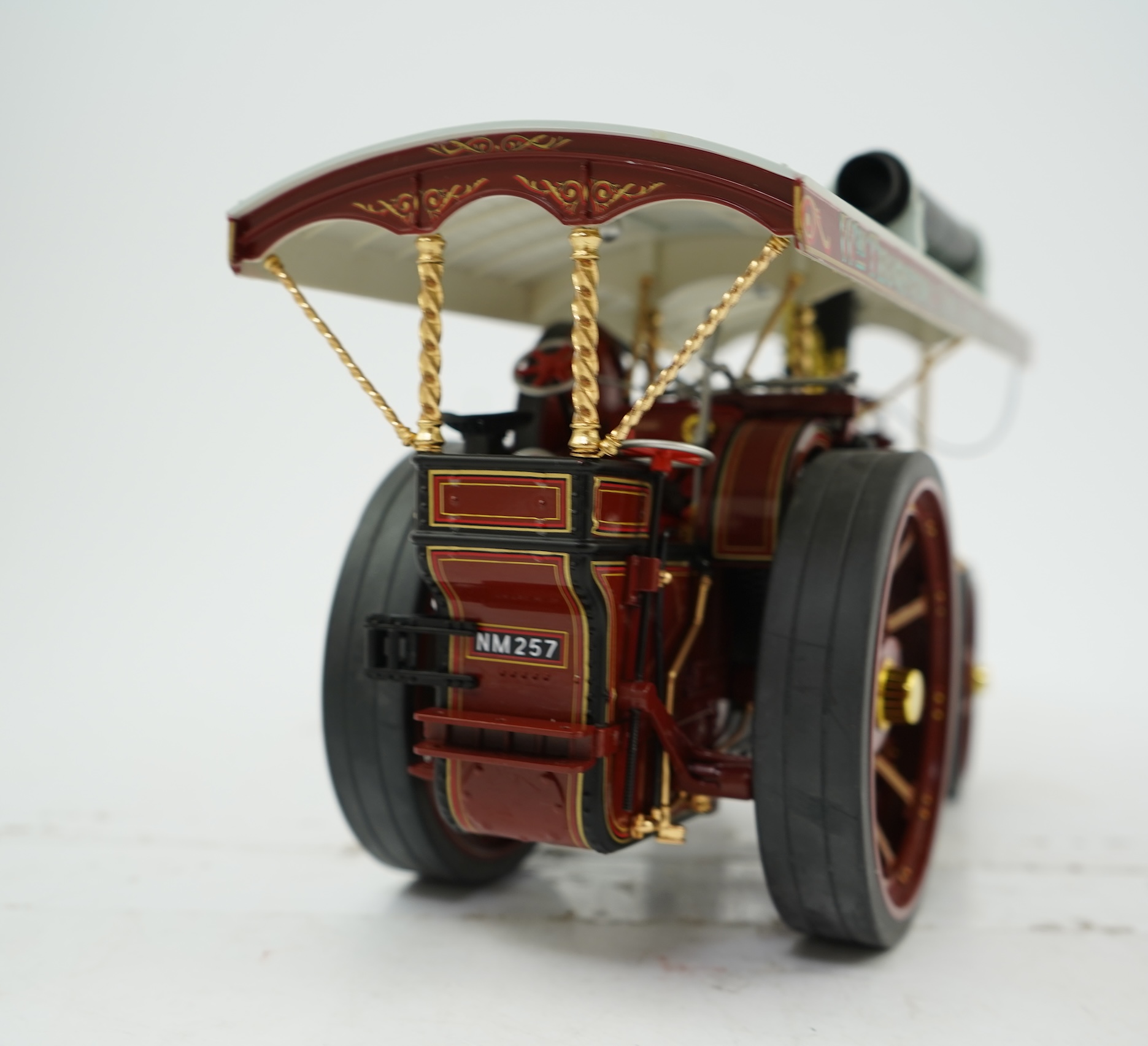 A Midsummer Models Ltd. 1:24 scale model of a Burrell Showman’s Engine, Britannia, in William Thurston and Son. Super Speed Cars livery, missing the original card box, but with an oak and Perspex display case